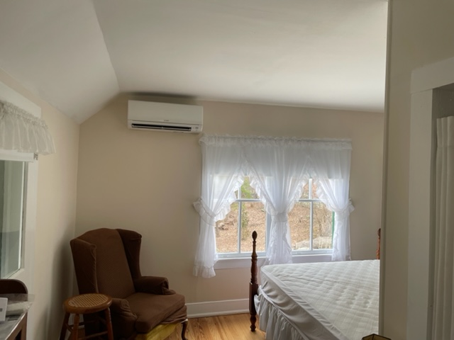 ductless mini split type aircon installed beside the window by small solutions